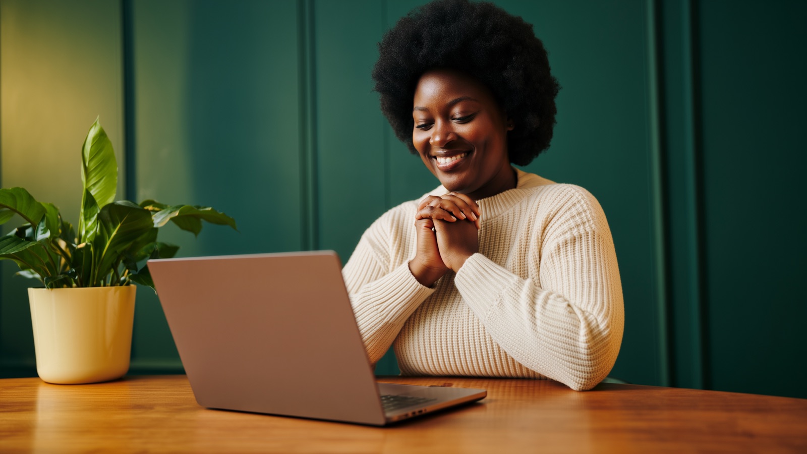 Customer reviewing AI-powered credit repair progress on a laptop